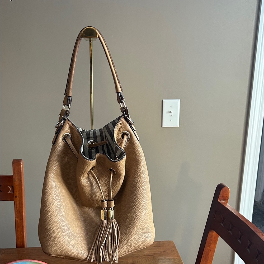 Henri Bendel Vintage Tan Leather Two Way Bucket Bag Striped Interior in EUC - Picture 1 of 11